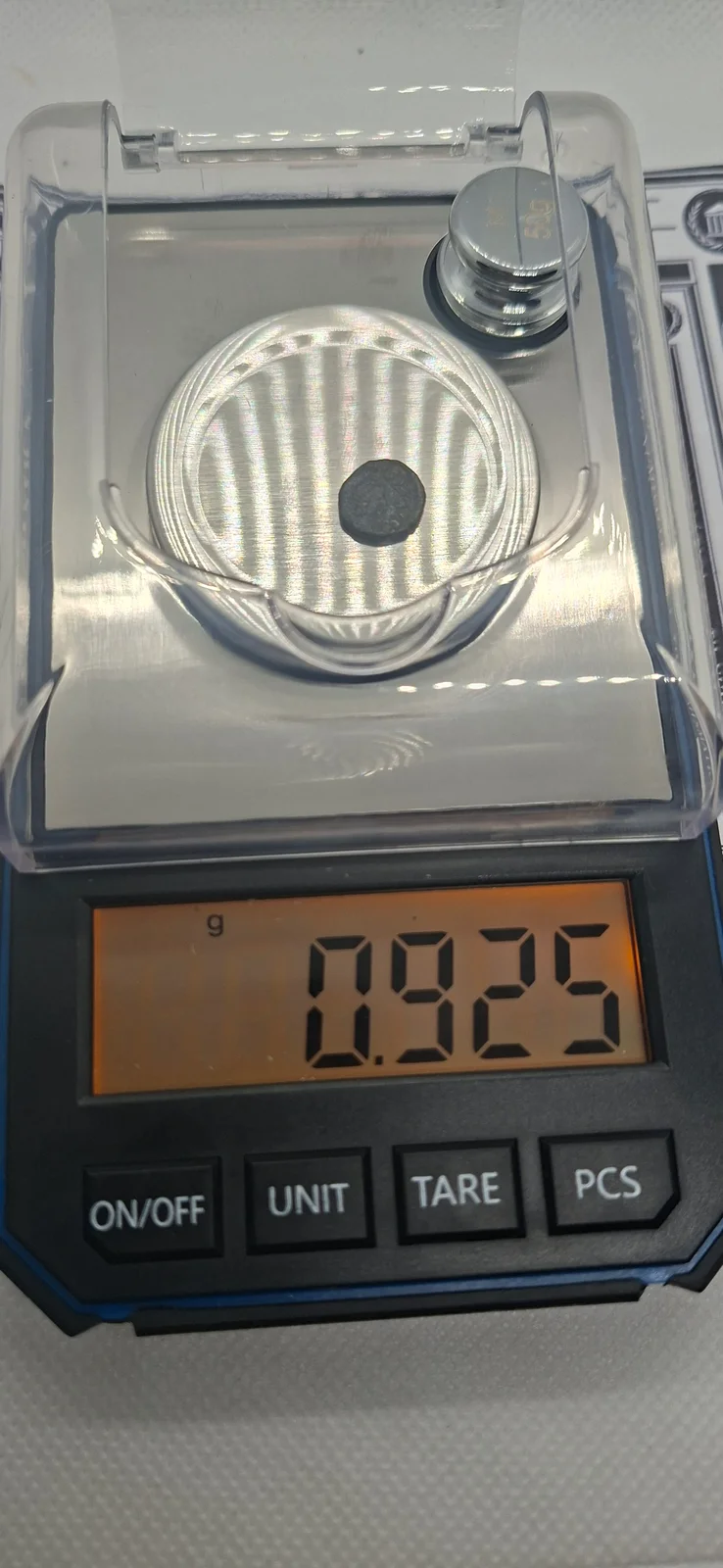 Peso (balança) da moeda TH-N-0084 — Marciano
