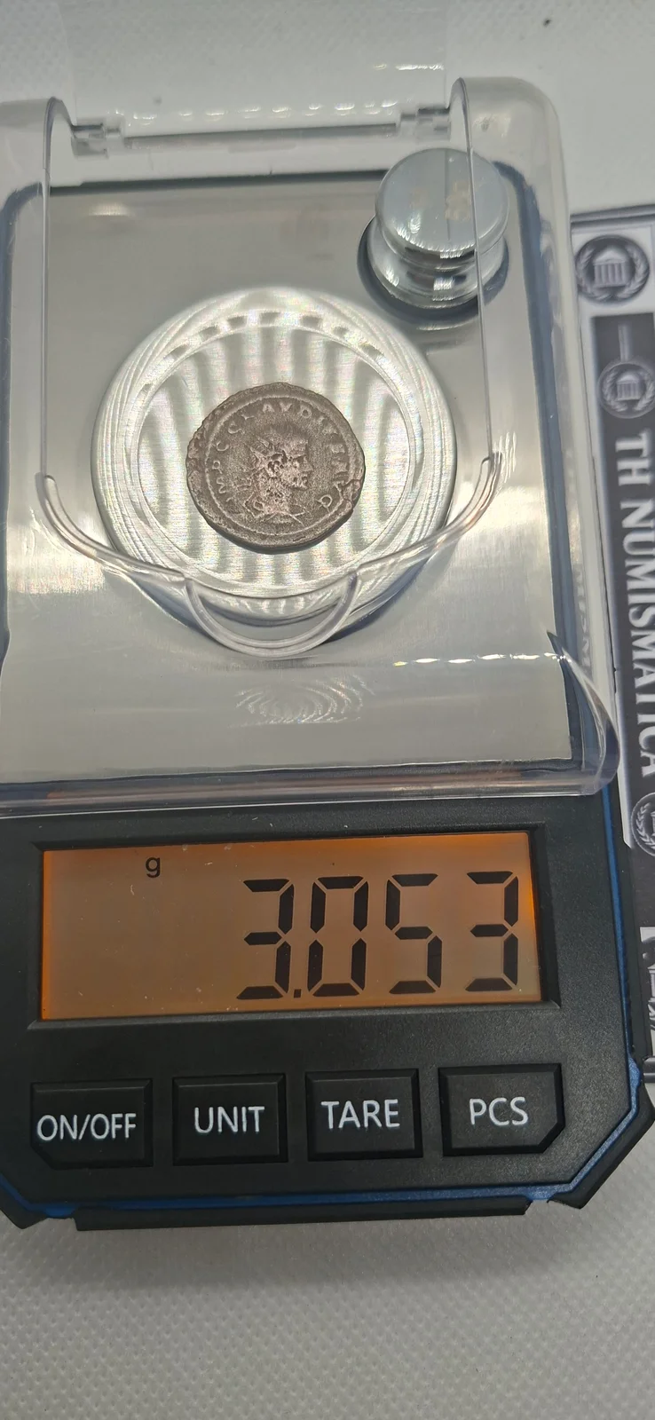 Peso (balança) da moeda TH-N-0093 — Cláudio II Gótico. Antoniniano