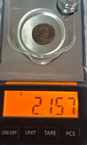 Peso (balança) da moeda TH-N-0226 — Galério ou Maximiano. 1/4 follis. GENIO POPVLI ROMANI