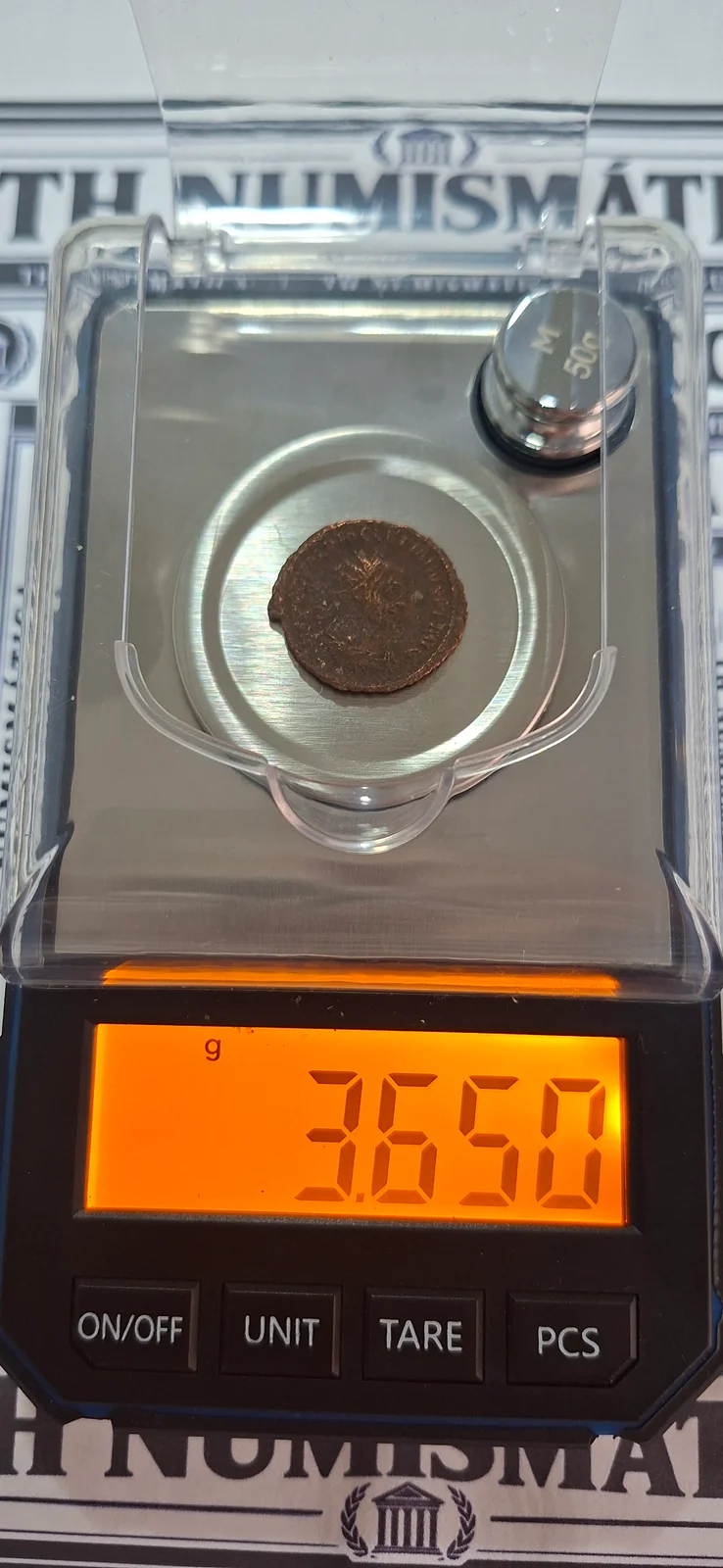 Peso (balança) da moeda TH-N-0232 — Diocleciano. Antoniniano prateado